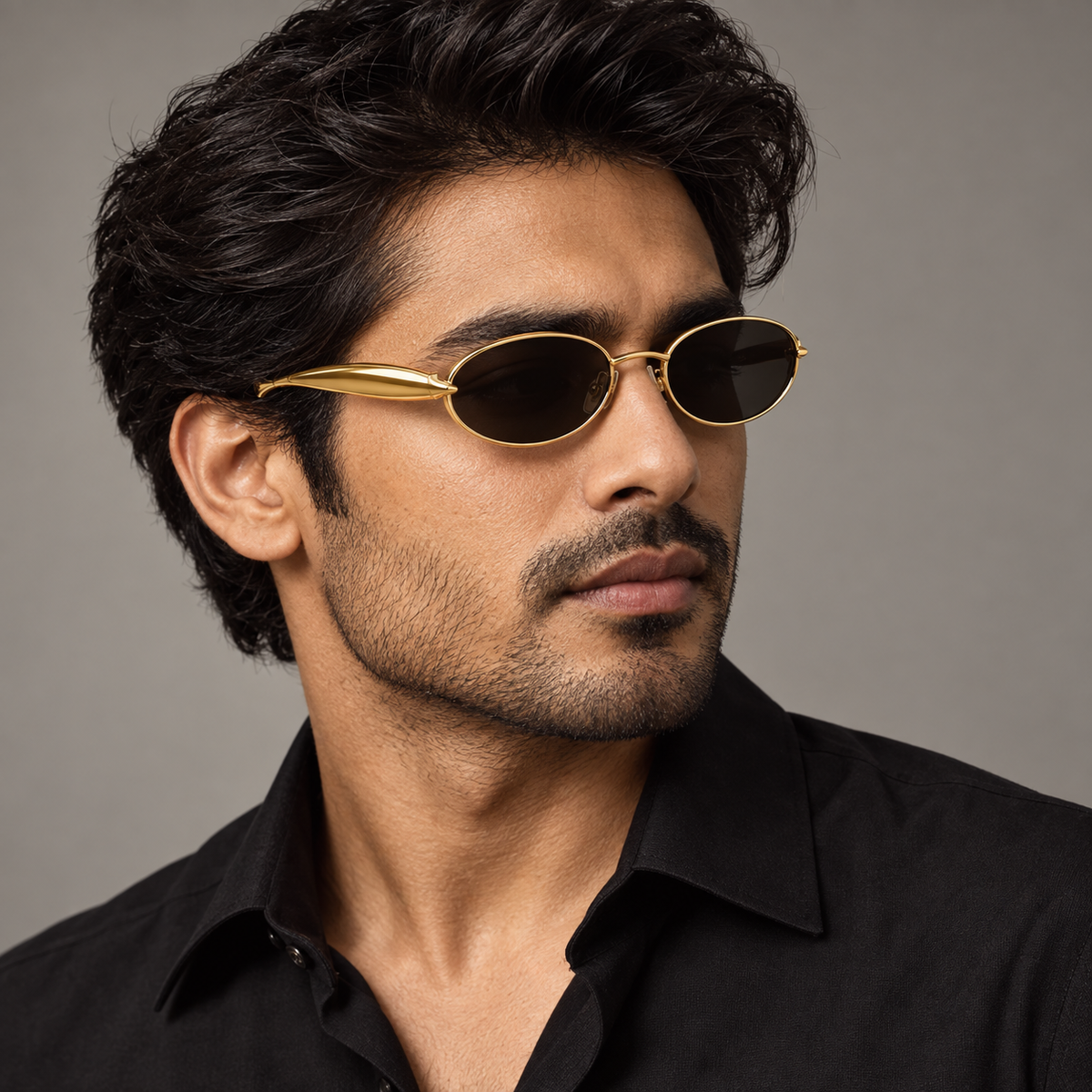 Man wearing Bottega Veneta BV1386S 001 gold oval sunglasses